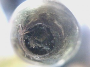 Close up of the home made tube which caused the leak.. Notice the runout.